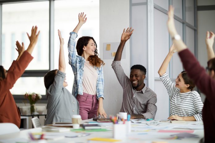 Contemporary Business People Raising Hands Contemporary Business People Raising Hands