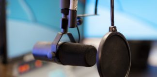 Microphone in modern radio station broadcasting studio