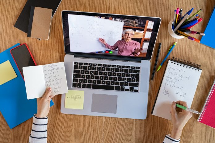 Student learning at home with online lesson