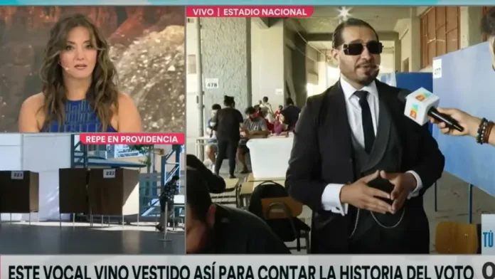 Vocal de mesa se caracteriza en vivo y destaca la importancia del voto en Chile. Vocal de mesa se caracteriza en vivo y destaca la importancia del voto en Chile.