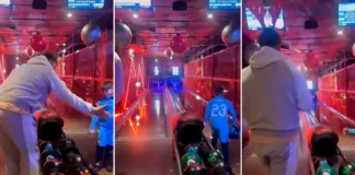 Dibu Martínez celebra con su hijo tras vencer al City